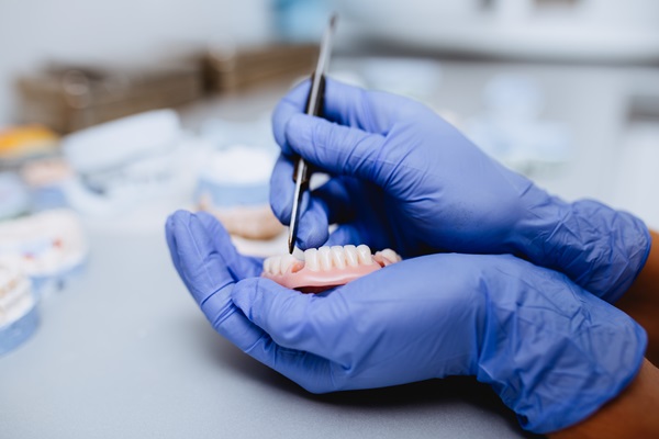 What Questions You Should Ask Your Dentist About Adjusting To New Dentures