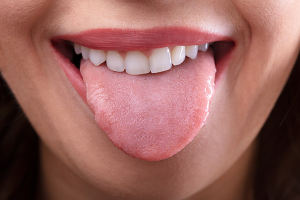Oral Hygiene Basics: The Importance of Cleaning Your Tongue from Smiles Dental Care in Mountain View, CA