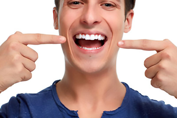 Replace Missing Teeth Through A Smile Makeover
